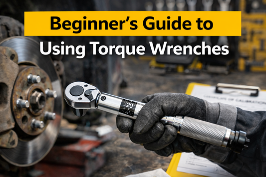 Torque wrench on a workbench surrounded by tools, illustrating beginner-friendly automotive repair and proper torque application